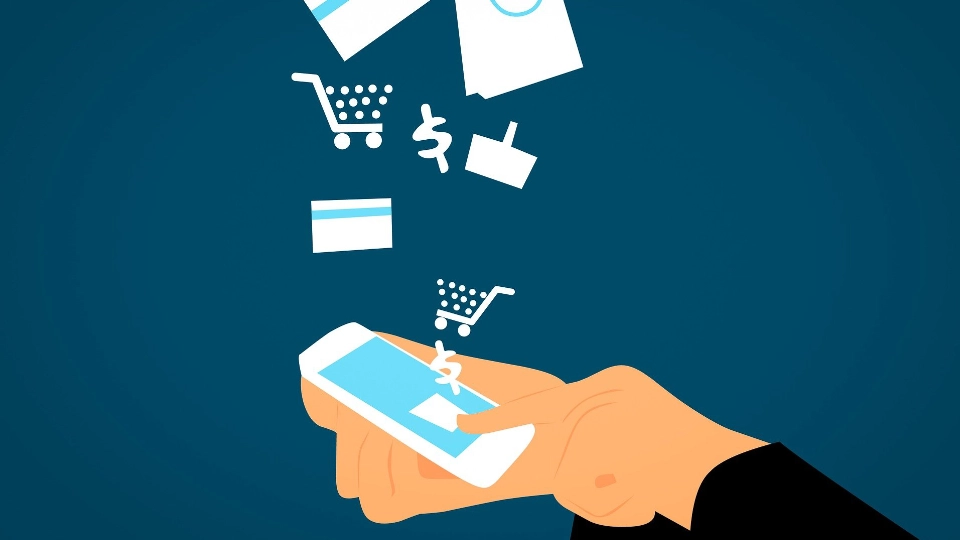 Illustration einer Hand mit Smartphone und schwebenden E-Commerce-Symbolen wie Einkaufswagen und Kreditkarte